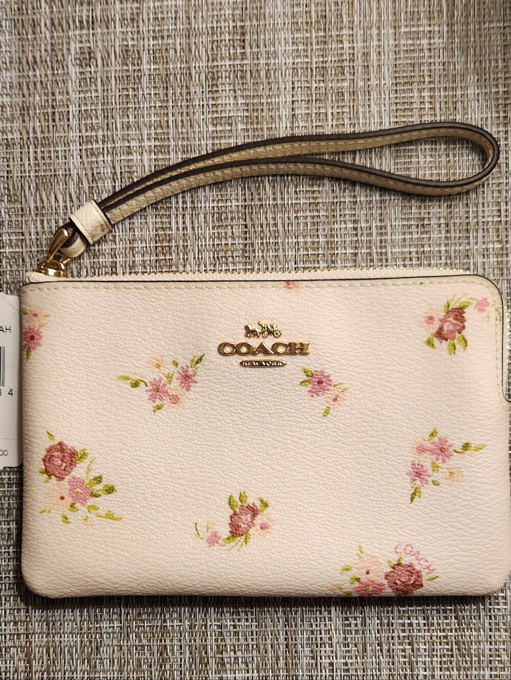 COACH Pink Floral Wristlet Pouch with Gold Hardware